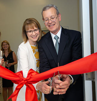 Natalie Altieri’s parents celebrate the <br>opening of the Fashion Technology Center