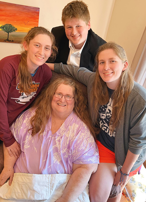 Karen Sanders with her three grandchildren.