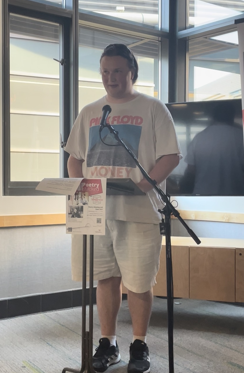 Anthony Brown reads at an open mic.