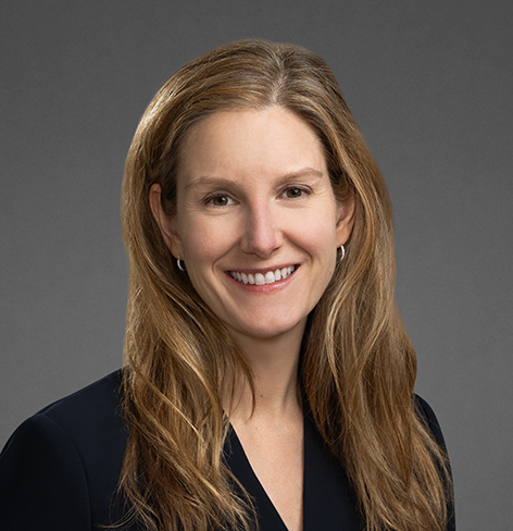 Photo of Amanda Wait smiling.