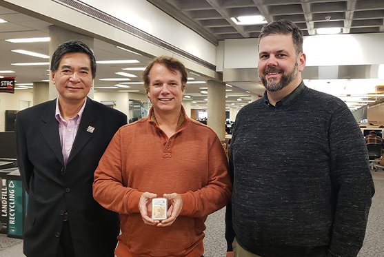 Mark and Rick Armstrong with Dean Wang
