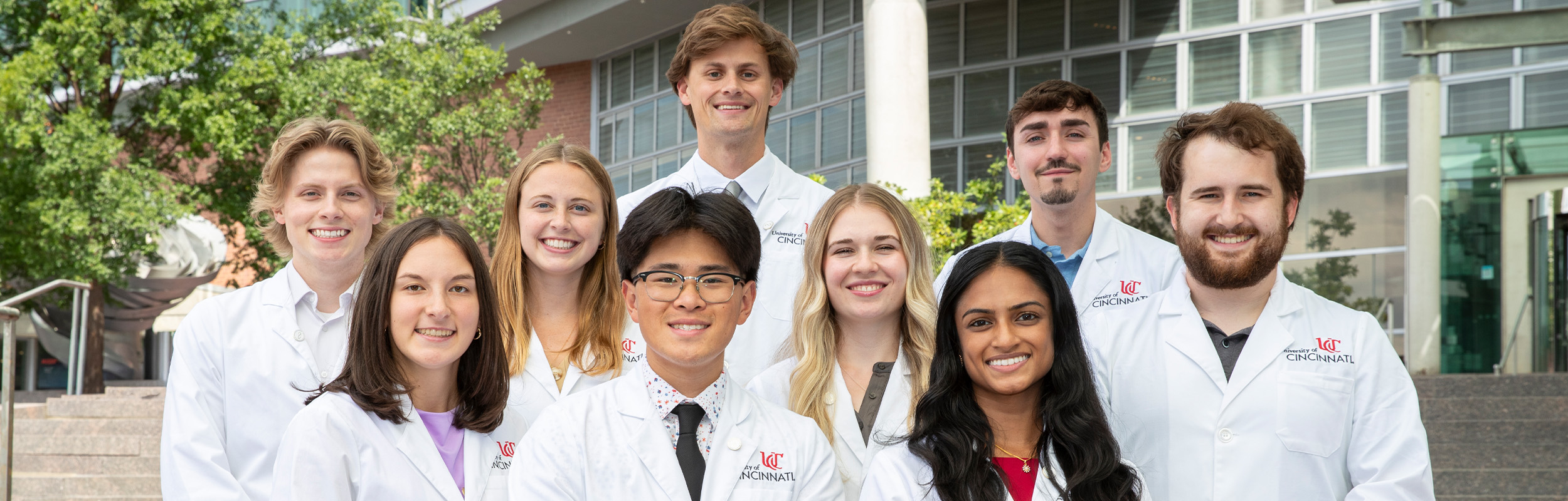  10 UC medical students on Care-Crawley steps.