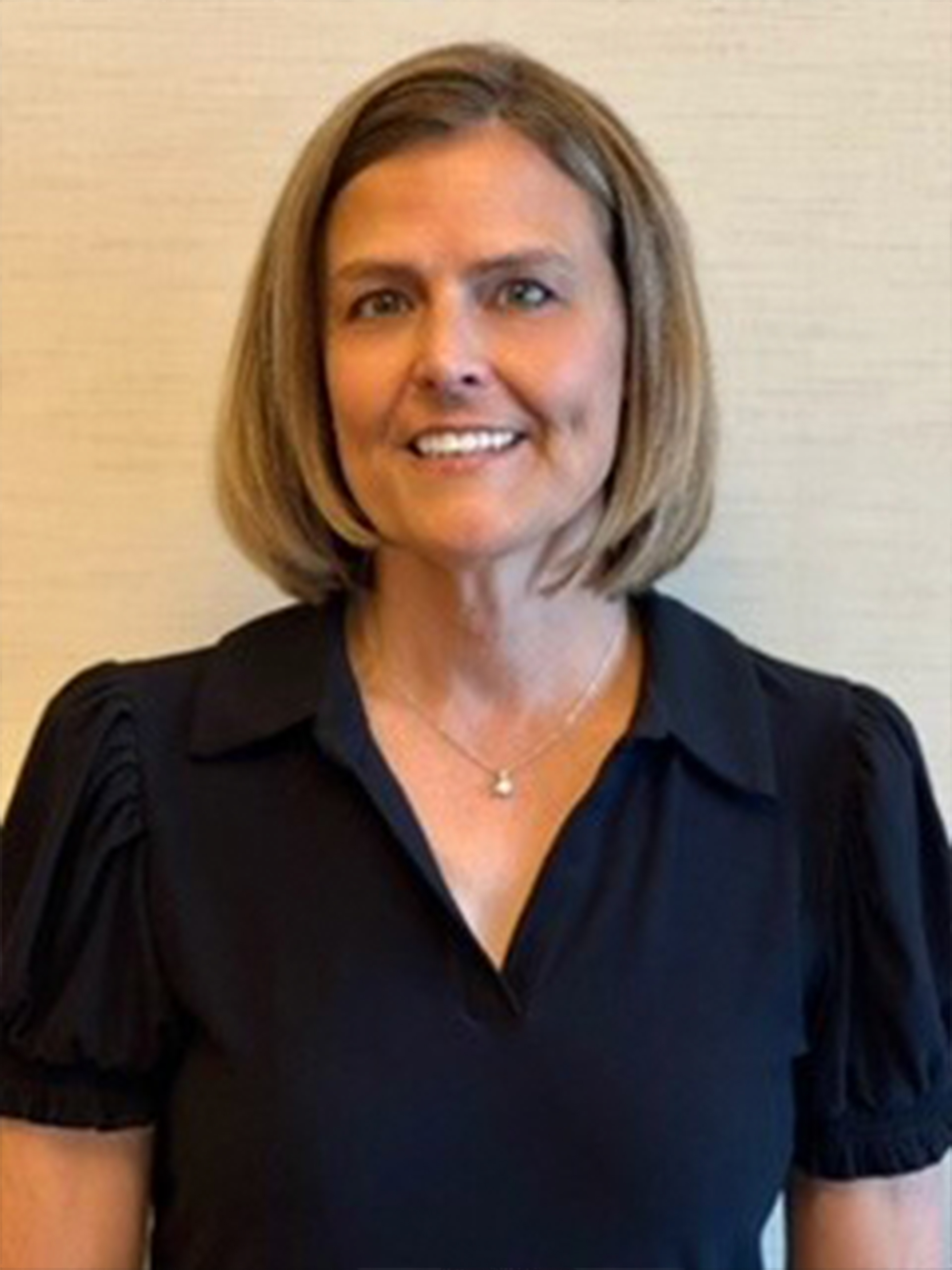 Christie Wolf in a black shirt